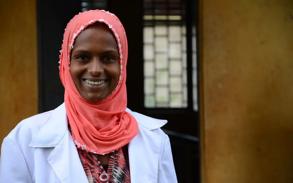 A health worker standing outside an Ethiopian health centre
